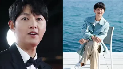 aktor Song Joong-ki dengan jas hitamnya dan suasana pantai